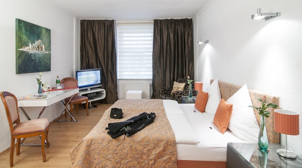 Hotel Service Apartments Am Prinzenplatz Kamp-Lintfort Room photo